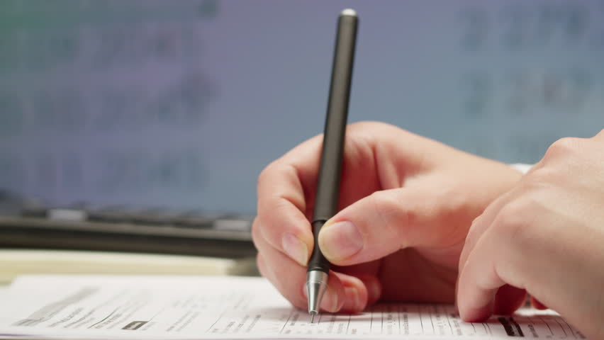 Blank W-9 and Form W8-BEN or 8W U.S. individual income tax return and Internal Revenue Service . Tax payment concept. Filing taxes document