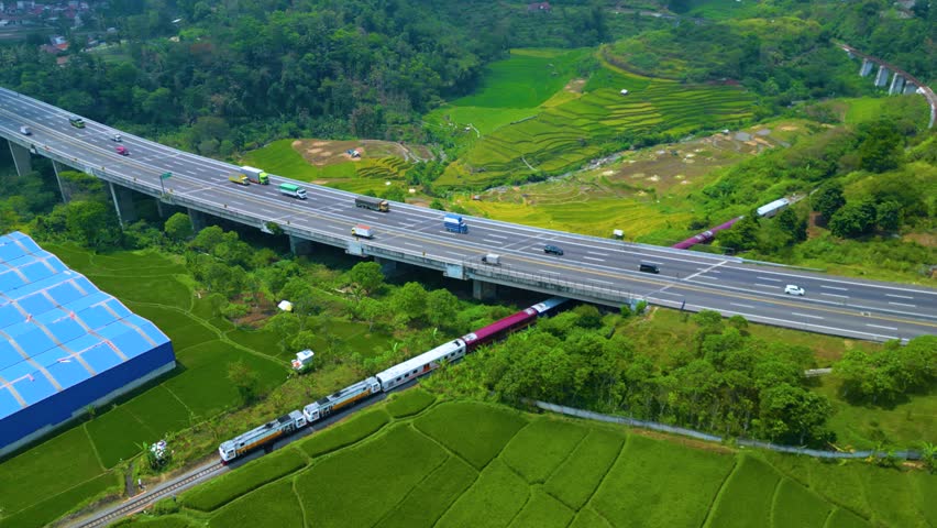 Aerial View of ASEAN Railway CEOs’ Conference (ARCEOs’ Conference) Special Train Crosses the Winding Track in Padalarang Area