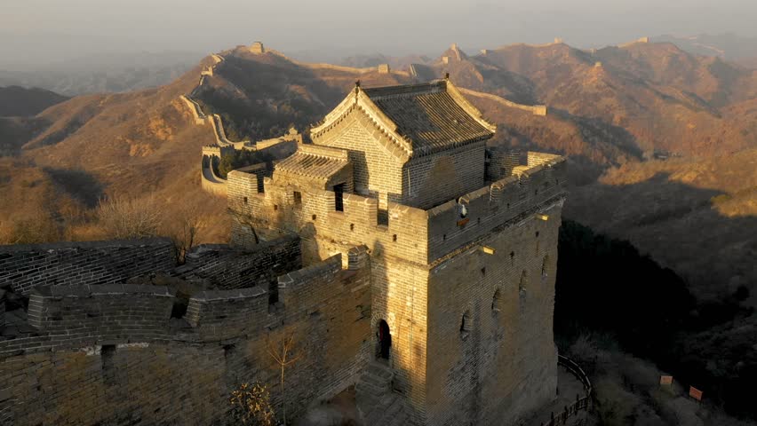 Flying over the Great Wall of China at Dawn