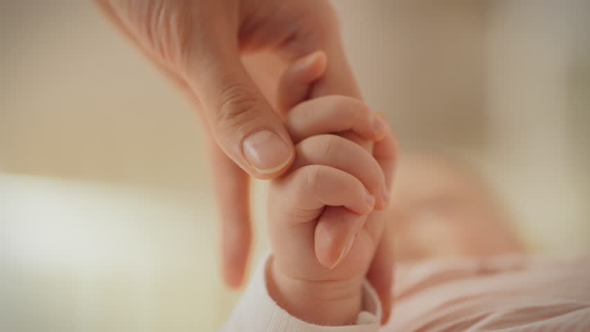 The gentle touch of a mother