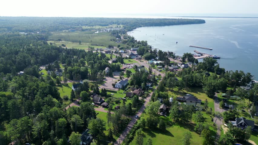 Beautiful Town Of La Pointe, Madeline Island, Wisconsin. Aerial Rotation Over The Picturesque Waterfront Town. Apostle Islands National Lakeshore Ferry Line To Bayfield.
