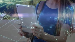 Smiling girl using tablet, network connections and data processing animation over. Technology, digital, connectivity, internet, communication, innovation - Powered by Shutterstock - Get 15% off with code: PIKWIZARD15