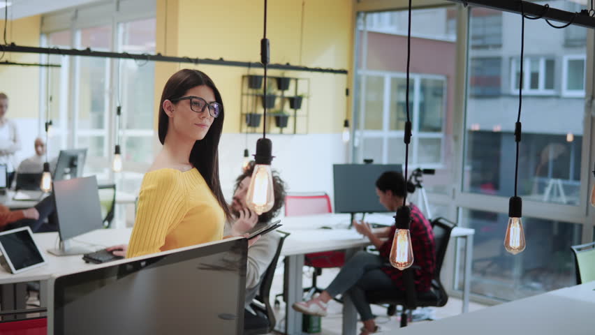 Smart, intelligent, friendly, likable portrait of an executive business woman manager, advisor, agent, representative with glasses