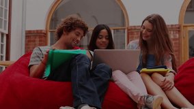 Processing data and loading animation over diverse students studying together. Technology, education, teamwork, diversity, learning - Powered by Shutterstock - Get 15% off with code: PIKWIZARD15