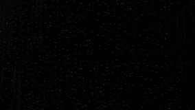 Closeup water rainfall, rain drops falling on window glass over black background - Powered by Shutterstock - Get 15% off with code: PIKWIZARD15