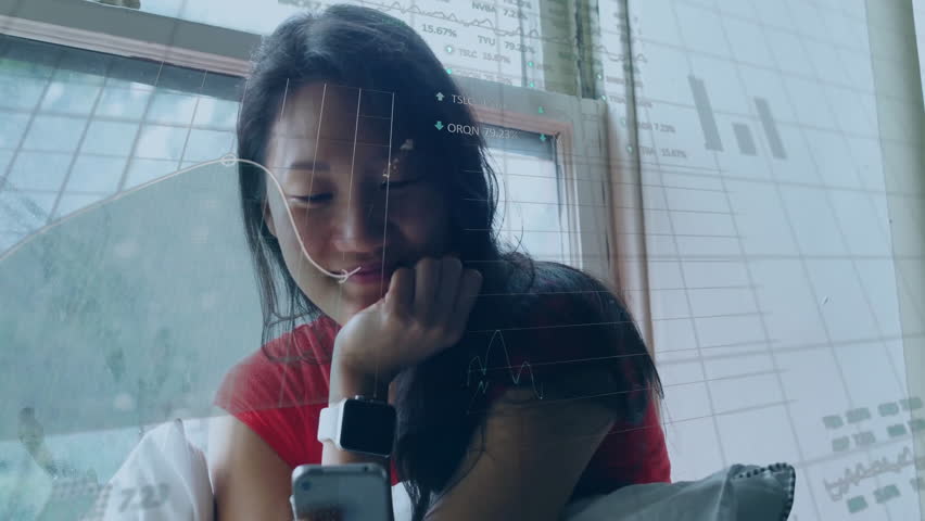 Financial data animation over woman using smartphone in cozy setting. Finance, technology, digital, home, analytics, multitasking - Powered by Shutterstock - Get 15% off with code: PIKWIZARD15