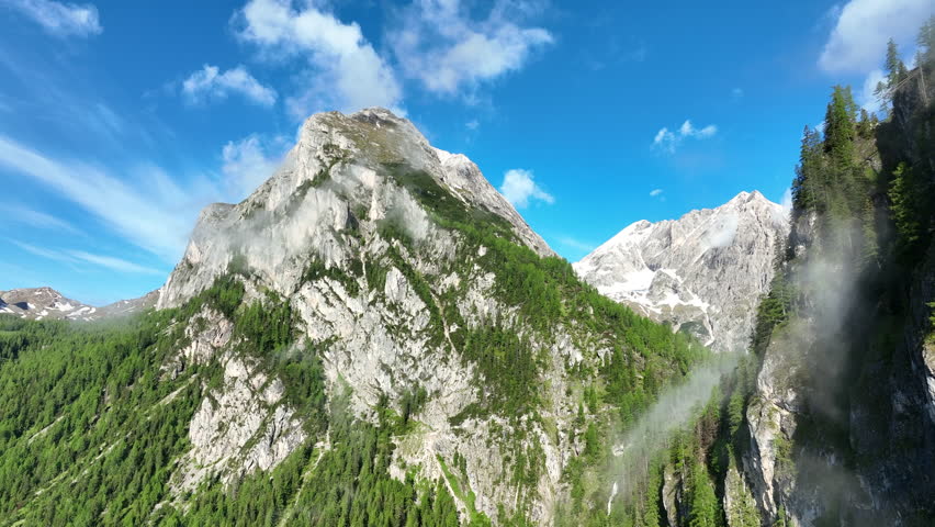 Fonch de Ombreta and Punta Penia in the Marmolada mountains in the Dolomites during springtime in Veneto Italy.