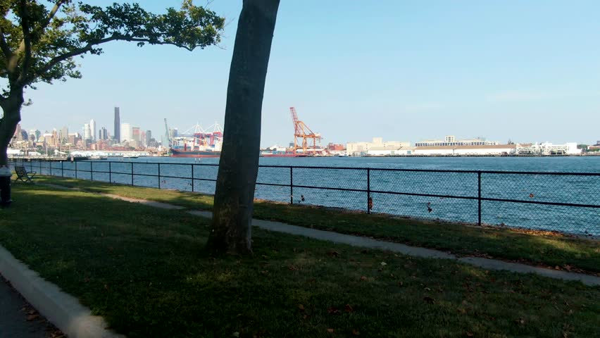 POV motion of walkway by water at Governor’s Island, New York