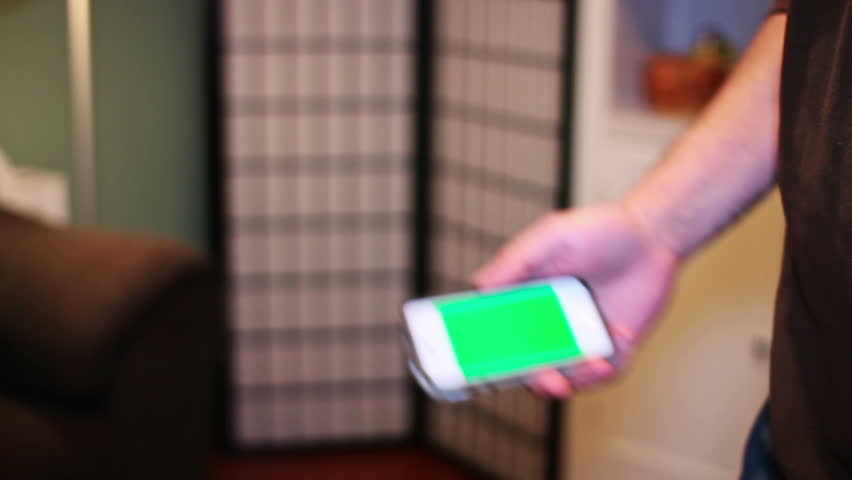 Using a green screened smartphone.