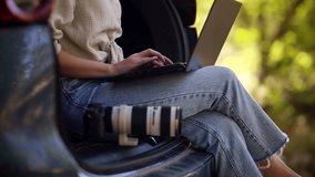 Influencer Photographer Transferring Image From Camera To Laptop Computer. Content Creator On Mobile Workplace. Social Media Influencer Create Post. Travel Blogger  Photographer Shot Picture For Blog - Powered by Shutterstock - Get 15% off with code: PIKWIZARD15