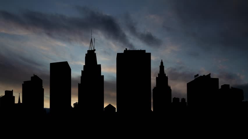 New Jersey: City View of Newark, Time Lapse at Sunrise with Fast Clouds and Dark Silhouette of Skyscrapers