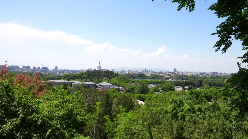Panoramic view of Beijing city from Prospect Hill with lush greenery and distant landmarks