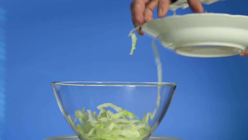 Vegetables are superimposed in a bowl for salad