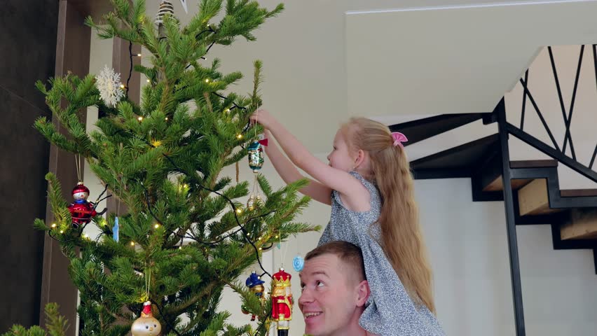 Each family member brings unique touch to Christmas tree symbol of love unity and support. Family gathers around tree holiday spirit shining brightly they decorate with love warmth and festive cheer.