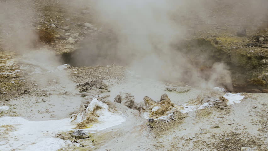 Cinematic shot of thermal steam vent in Yellowstone National Park, USA
