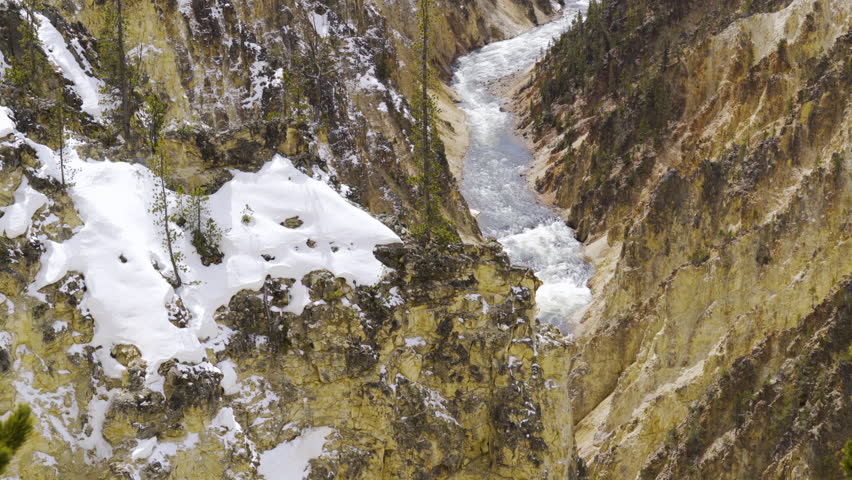 Cinematic shot of scenic landscape at Lower Yellowstone River Falls in Yellowstone National Park, USA