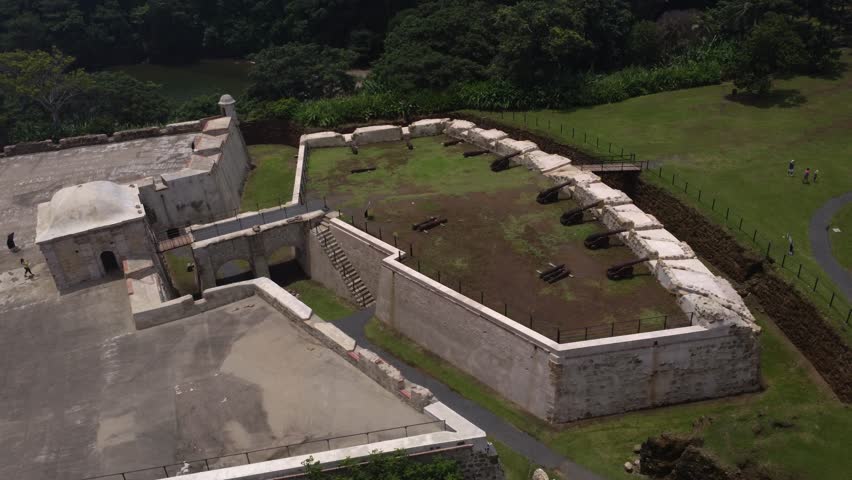 4k Drone video of Fuerte San Lorenzo in the Colon province of Panama. You can see the canons and walls that protect the fortress and a lot of trees and greenery around it.