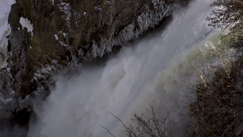 Cinematic shot of scenic landscape at Lower Yellowstone River Falls in Yellowstone National Park, USA