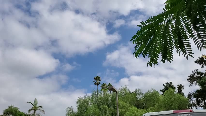 folding clouds in a blue sky