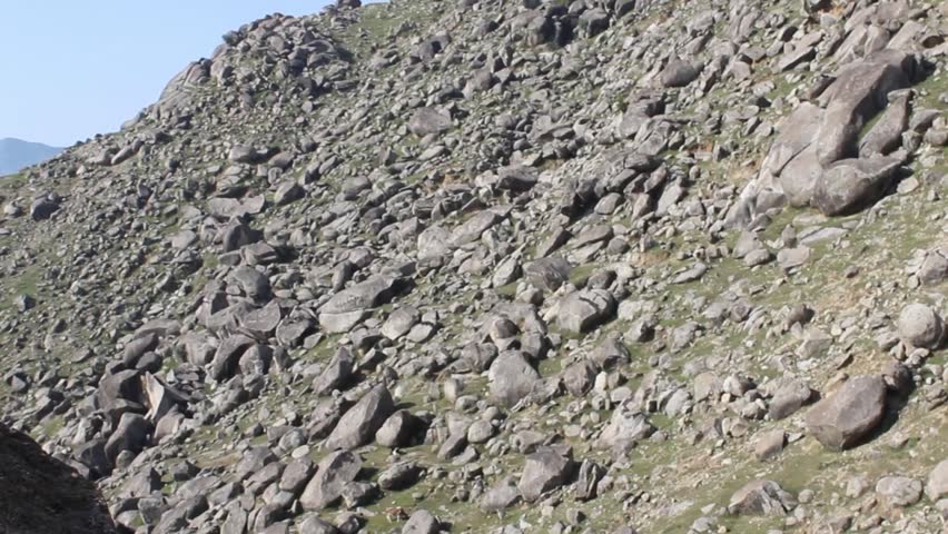 A footage of Rocky mountain, having large Stones or Boulders