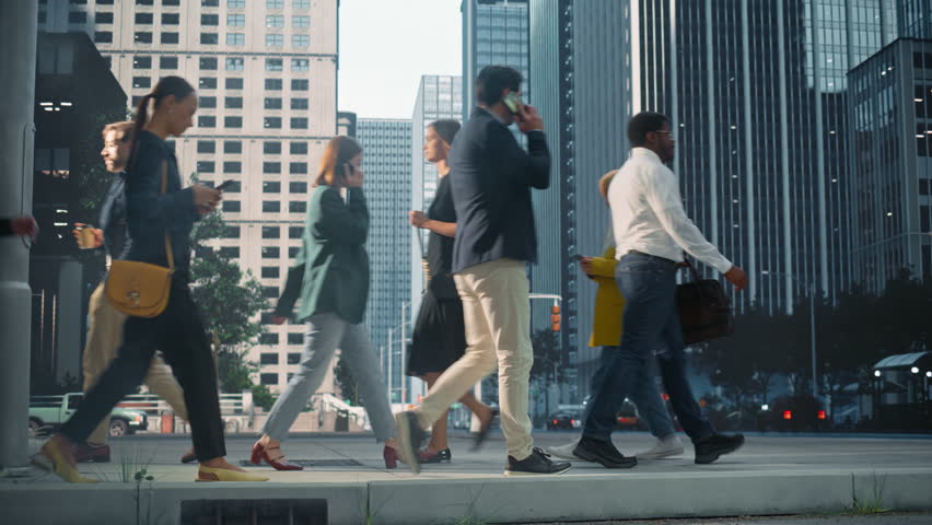 Side View of a Group of People Commuting to Work, Focused on Smartphones and Daily Activities. Concept of Modern Urban Life, Capitalism, Business and Corporate Finance, Connectivity and Technology