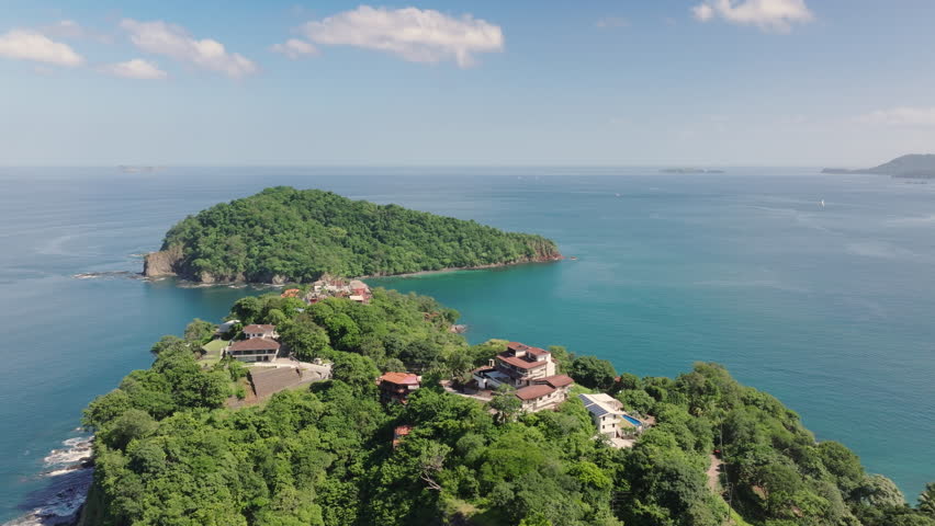 Experience the stunning aerial view of Santa Cruz, Costa Rica, showcasing its lush greenery and serene coastline, perfect for nature lovers and adventurous travelers alike