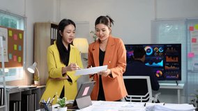 Business team giving advice Meeting and brainstorming, financial investment, real estate project, strategy, planning, calculation, pointing at graph chart on desk at office. - Powered by Shutterstock - Get 15% off with code: PIKWIZARD15