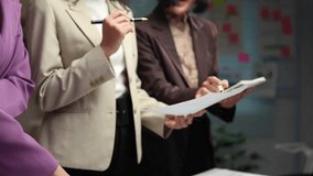 Business team giving advice Meeting and brainstorming, financial investment, real estate project, strategy, planning, calculation, pointing at graph chart on desk at office. - Powered by Shutterstock - Get 15% off with code: PIKWIZARD15