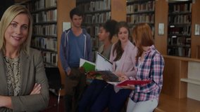 Binary code animation overlaying diverse students studying in school library. Technology, education, learning, digital, data, coding - Powered by Shutterstock - Get 15% off with code: PIKWIZARD15