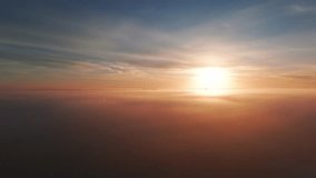 A serene sunset over a calm horizon where the clouds and sky blend in a beautiful display of orange and yellow hues reflecting the evening glow.The scene captures the tranquil beauty of nature at dusk - Powered by Shutterstock - Get 15% off with code: PIKWIZARD15