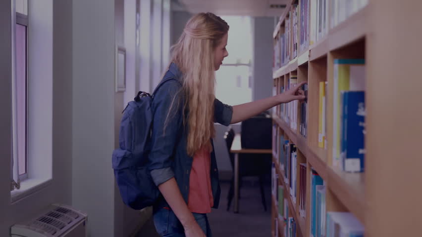Browsing books in library, woman with binary code animation overlay. reading, technology, education, digital, learning, knowledge