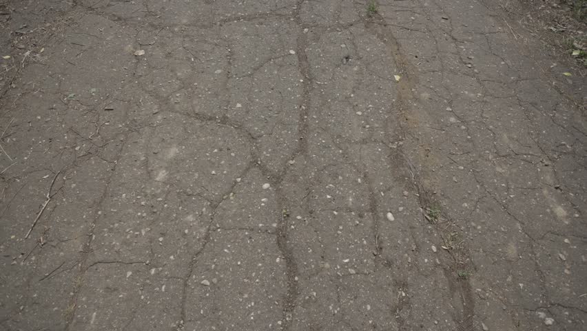 the road is full of holes, bad asphalt