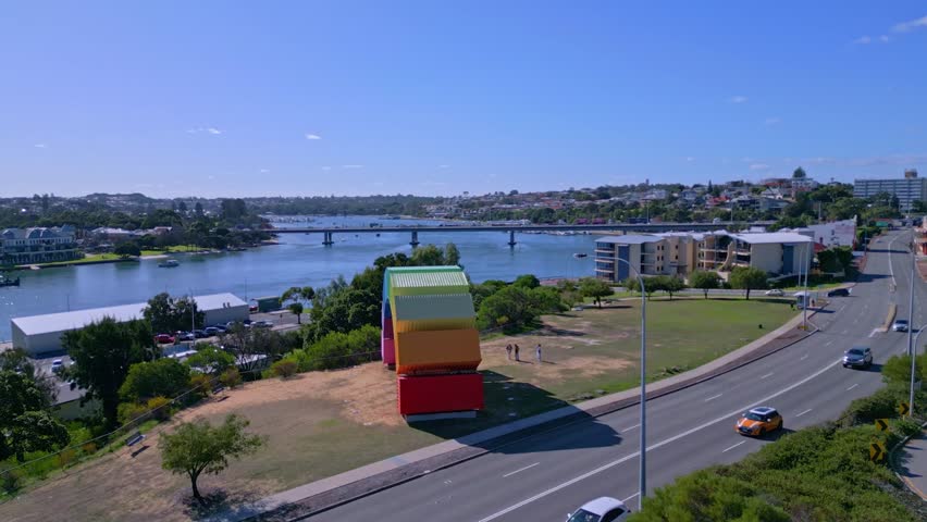Rising tilt shot of The Containbow art sculpture in Fremantle, Perth, Australia