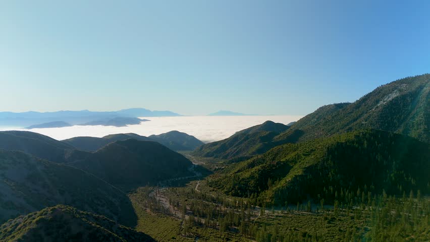 Inversion Clouds Called Marine Layer In San Gabriel Mountains, Angeles National Forest, California. drone shot