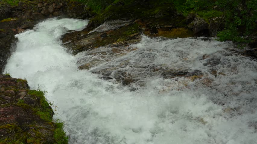 Norway - a torrent of water over sticks and stones