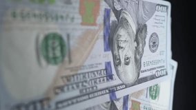 Vertical video of hundred dollar bills - Powered by Shutterstock - Get 15% off with code: PIKWIZARD15