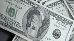 Vertical video of hundred dollar bills - Powered by Shutterstock - Get 15% off with code: PIKWIZARD15