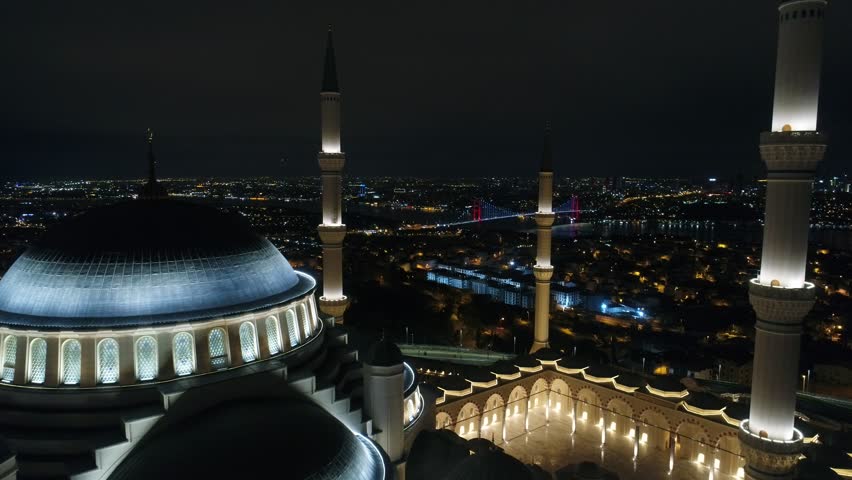 Aerial view of Çamlıca Mosque in Istanbul at night. Aerial view of Istanbul night lighting. Istanbul general bridge and night view