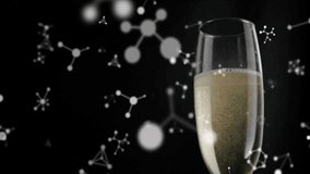 Animating molecular structure over champagne glass on black background. Science, chemistry, celebration, animation, laboratory, experiment - Powered by Shutterstock - Get 15% off with code: PIKWIZARD15