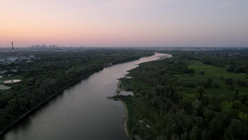 Vistula River in Warsaw, Poland, forest nature field, aerial city skyline
