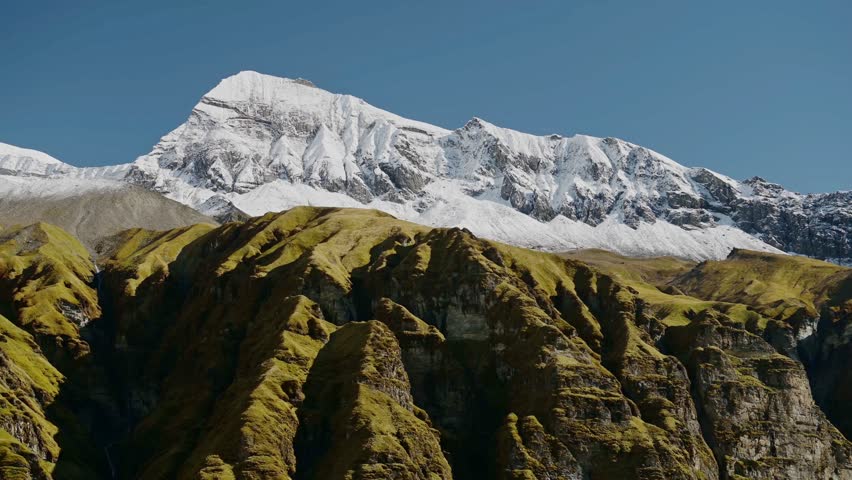Snowcapped Mountains Snowline in Himalayas in Nepal, Snow Line with Snowy Peaks and Beautiful Dramatic Big Mountain Landscape Scenery on Blue Sky Sunny Day in High Altitude Terrain