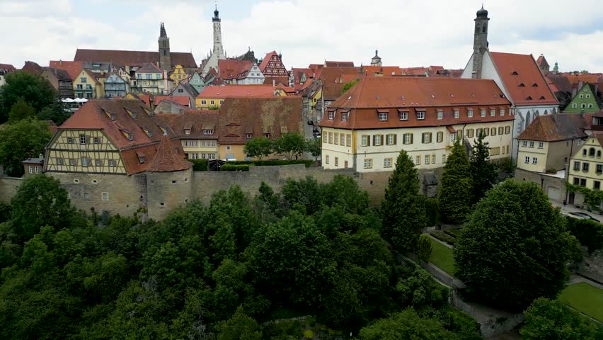 4K Aerial Drone Video of the Buildings along the Wall of the Bavarian town of Rothenburg, Germany