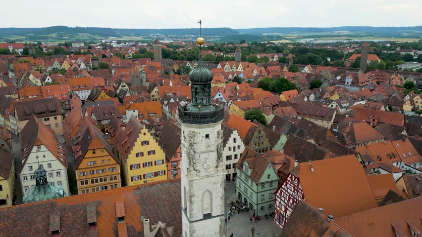 4K Aerial Drone Video of the Historic Town Hall Tower on the Market Square of the Walled City of Rothenburg ob der Tauber, Germany