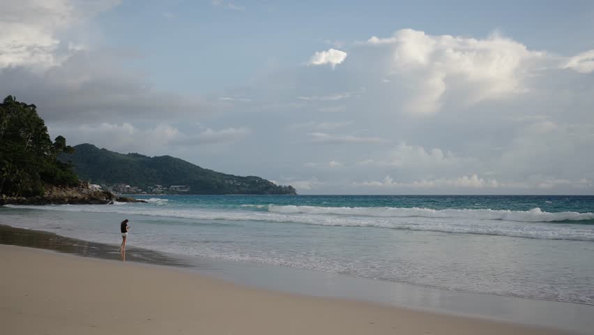 Thailand beach sea. Landscape view of beach sea and sand in summer sun. Beach space area background. Amazing sandy palm beach and turquoise sea water background.