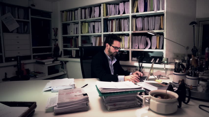 Partners at work discussing the agenda of the next weeks at the office