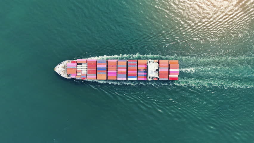 Cargo container ship carrying container and running out international container port customs shipyard sea port concept smart logistic service. Portrait video Container Ship.	