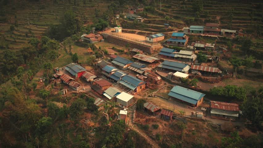 Aerial view of Simle Village of Gorkha Nepal, Himalayas on Background