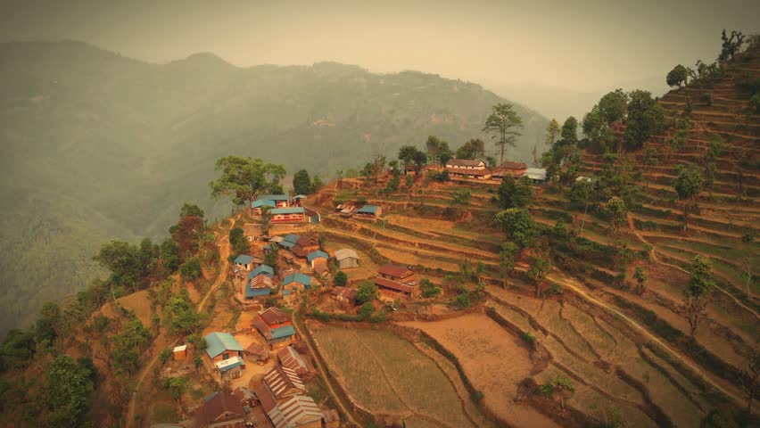 Aerial view of Simle Village of Gorkha Nepal, Himalayas on Background