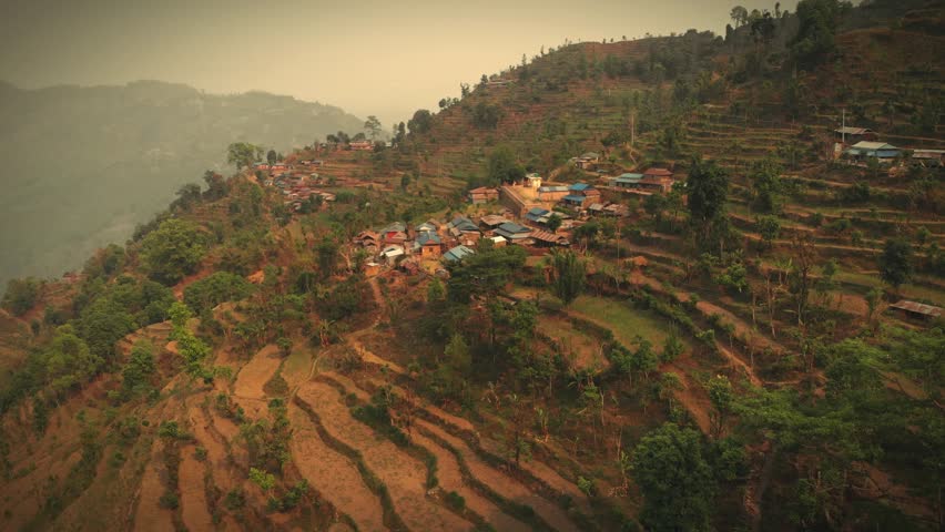 Aerial view of Simle Village of Gorkha Nepal, Himalayas on Background