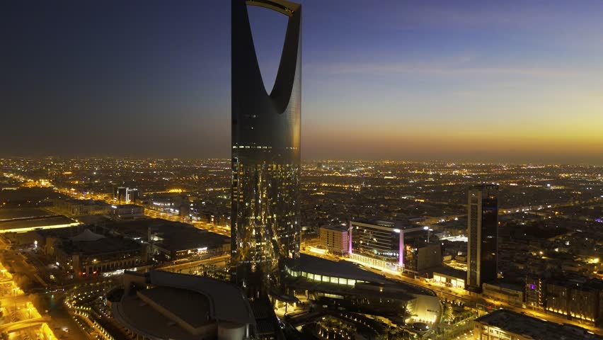 Drone shot flying. Saudi Arabia. Riyadh. Kingdom tower. Sunset. Evening.